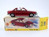a red toy car sitting on top of a box
