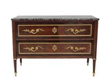 a wooden chest of drawers with a marble top