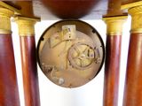 a clock that is sitting on top of a table