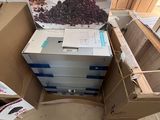a cardboard box with a bunch of coffee beans in it