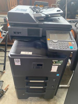a printer that is sitting on top of a printer