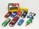 a lot of toy cars that are sitting on a table