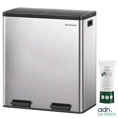 une photo d'une poubelle en acier inoxydable à côté d'un paquet de papier toilette