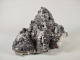 a close up of a piece of rock on a white surface