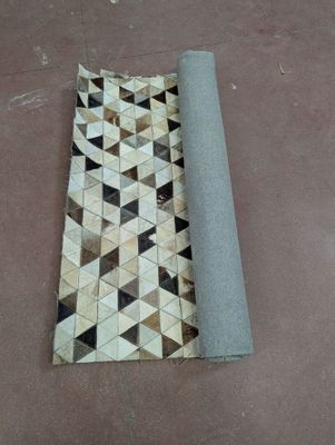 an image of a piece of tile laying on the floor