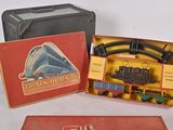 a box with a train set in it on a table