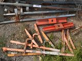 many pieces of wood that are laying on the ground