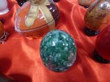 a table with a lot of different glass objects on it