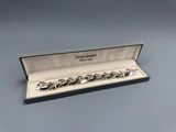an image of a set of five rings in a box