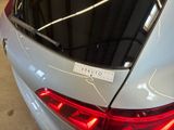 a close up of a car with a sticker on it
