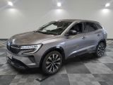 the new 2020 kia kole suv is parked in a showroom