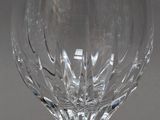 a close up of a wine glass on a table