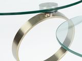 a glass table with a ring on top of it