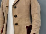 an image of a woman ' s coat on a mannequin mannequin