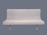 a white bench that is sitting on a blue background
