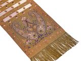 a close up of a scarf with a paisley design on it