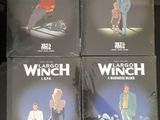 Quatre DVD du film « Winch » sont posés sur une table