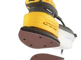 a close up of a sanding machine with a sanding disc