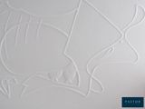 a drawing of a fish on the wall of a room