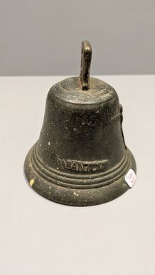 a bell that is sitting on a table