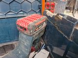 a tool that is sitting in the back of a truck