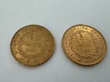 two gold coins, one of which is a sovereign and the other of which is a sovereign