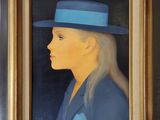 a painting of a woman with a blue hat in a brown frame