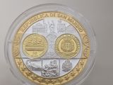 a close up of a coin in a plastic container on a table