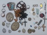 a lot of religious items that are on the table