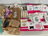 a table with a lot of crafting supplies on it