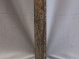 a close up of an old hammer on a white background