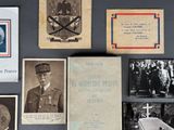 an old photo of a group of military memorabilias on a table