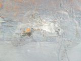 a close up of a piece of metal with rust on it