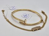 a close up of a bracelet and a bracelet with a chain