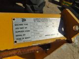the back end of a machine that is sitting on the ground