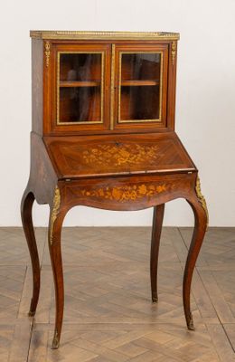 an image of a small desk with a glass door on top