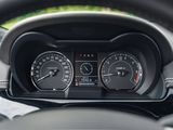 a close up of a car dashboard with a speedometer and gauges