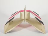 an open wallet with a pink and black stripe inside on a white background