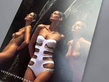 a calendar with a picture of two women in bathing suits on it