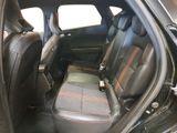 a picture of the inside of a car with leather seats