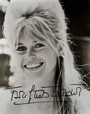 black and white photograph of a smiling woman with long hair
