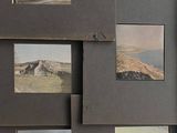 a picture of a bunch of pictures hanging on a wall