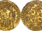 a gold coin with an image of a man holding a sword
