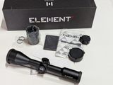 an image of a close up of a rifle scope on a table
