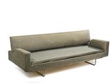 an image of a couch that is sitting on a white surface