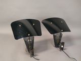 pair of black lamps on a white background with a white background