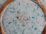 a picture of a close up of a bowl on a table