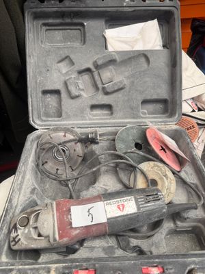 an open tool case with tools in it on a table