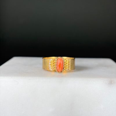 Bague ruban en or jaune 585/1000 (14K) ornée en son centre d…