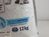 a bag of dry dog food sitting on a table